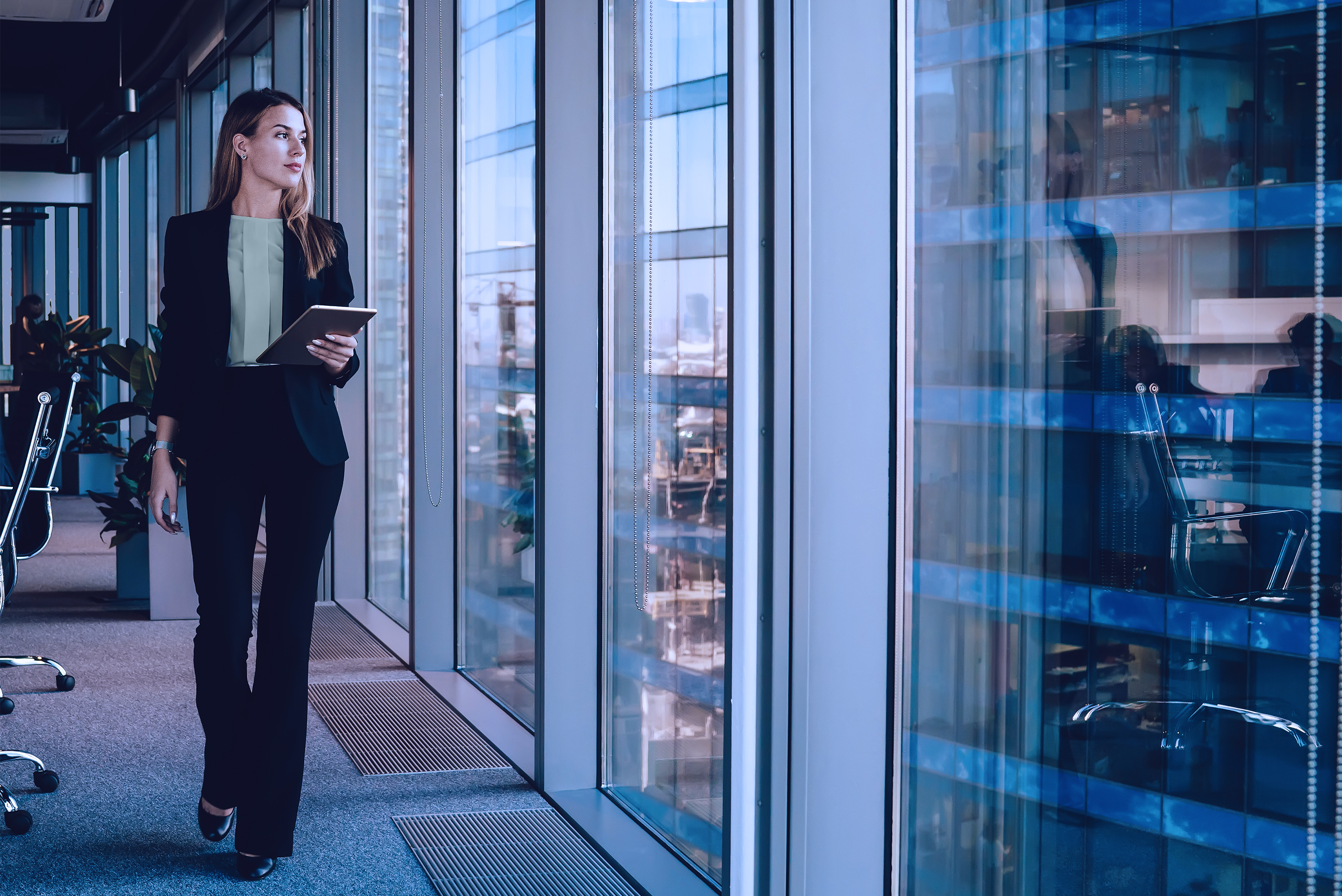 Young business woman walking